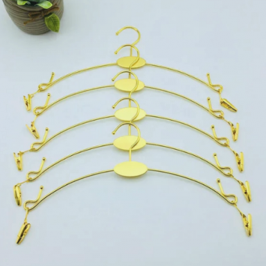 Clothes Hanger with Clips, metal in "Gold" color. Length 280 mm Clothes Hanger with Clips, metal in "Gold" color. Length 280 mm
