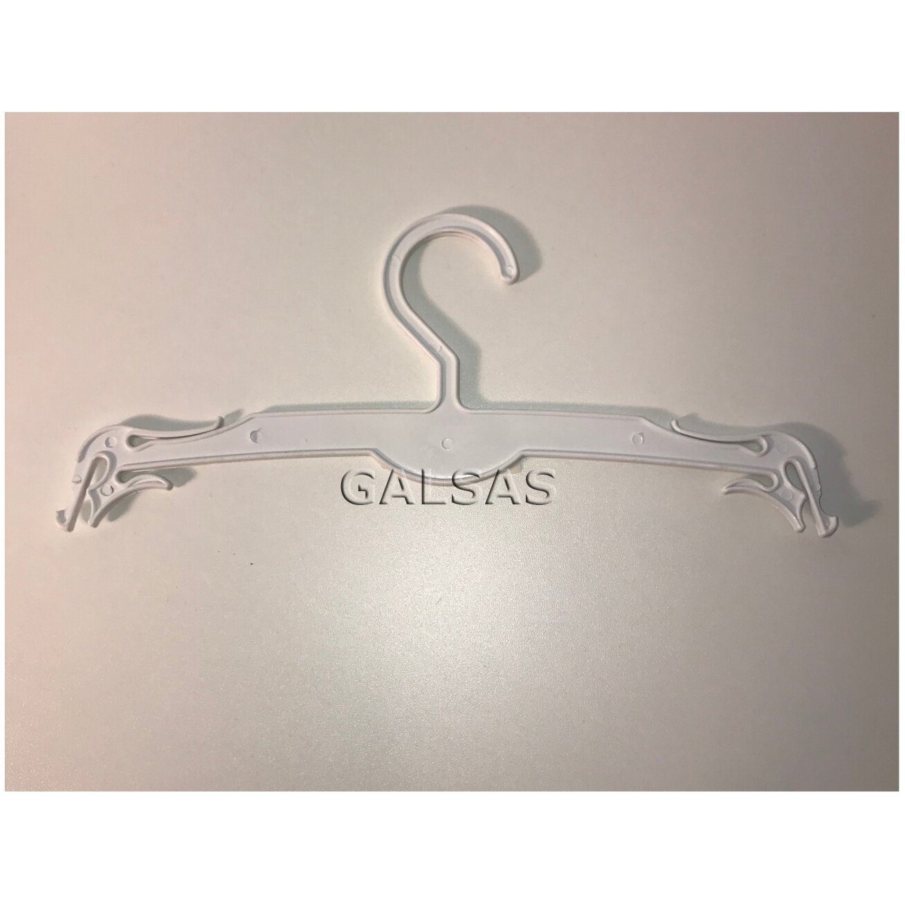 Apakšveļas pakaramais. Balta plastmasa. Garums 26,5 cm.Tirdzniecība iepakojumos pa 100 gab. 1 Apakšveļas pakaramais. Balta plastmasa. Garums 26,5 cm.Tirdzniecība iepakojumos pa 100 gab. 1